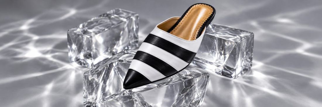 Close-up of a black and white striped Portuguese shoe